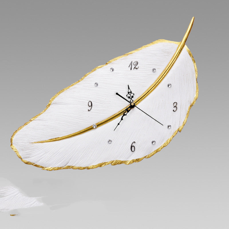 Modern Feather Wall Clock – Sculptural Metallic Decor