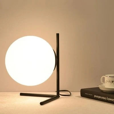 Lampe de chevet design bras dorés & boule de verre
