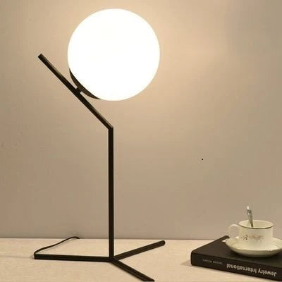 Lampe de chevet design bras dorés & boule de verre
