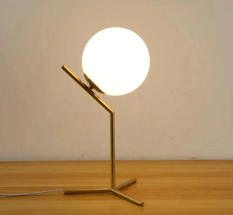 Lampe de chevet design bras dorés & boule de verre